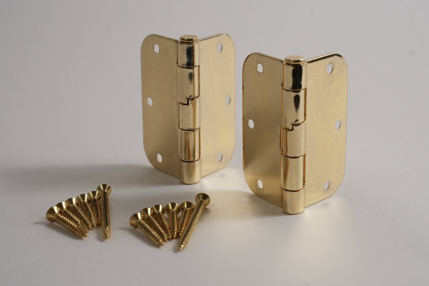 Aksis Hinge – Built-In Door Stop Hinge (Set with Screws) Brass