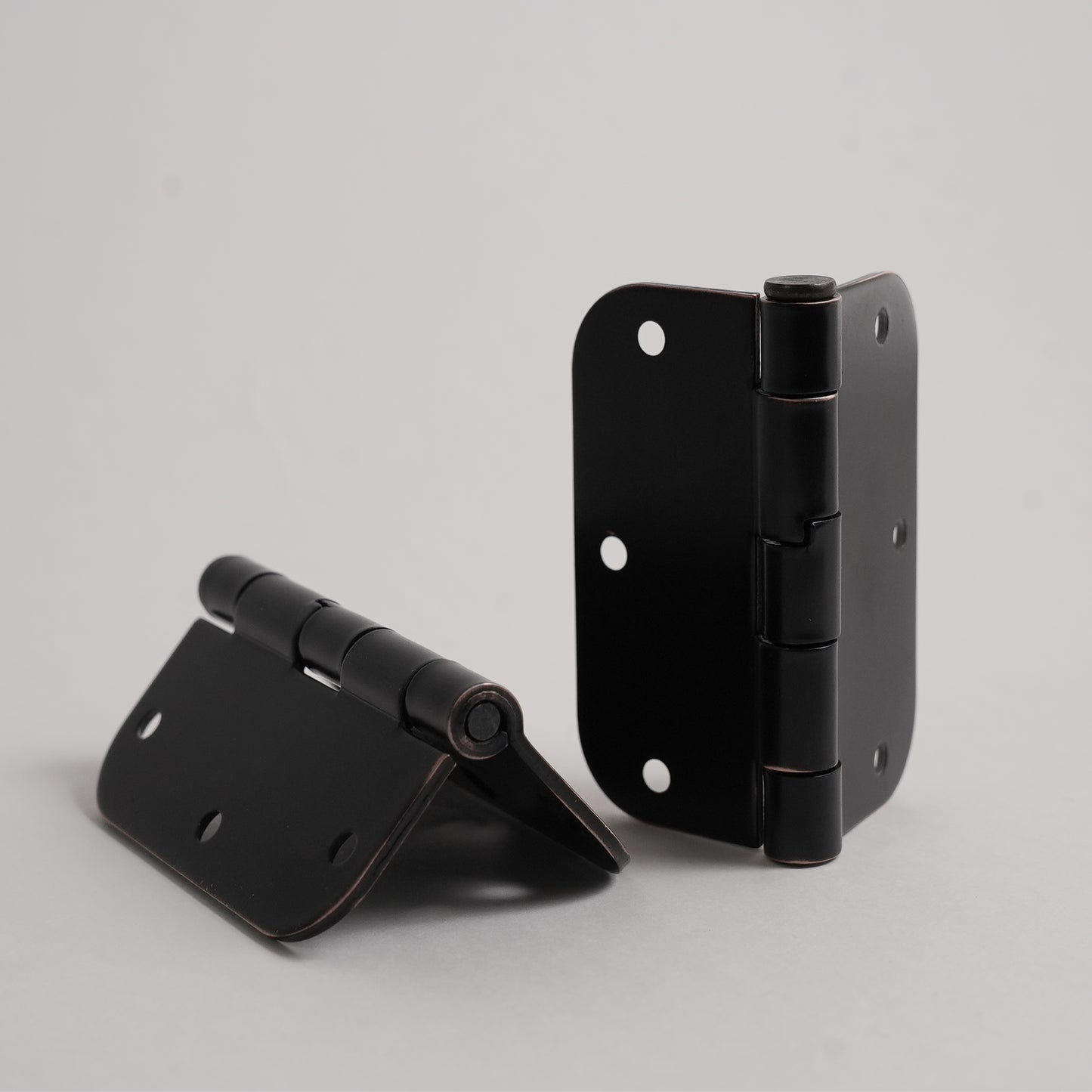 Aksis Hinge – Built-In Door Stop Hinge (Set with Screws) Rubbed Bronze