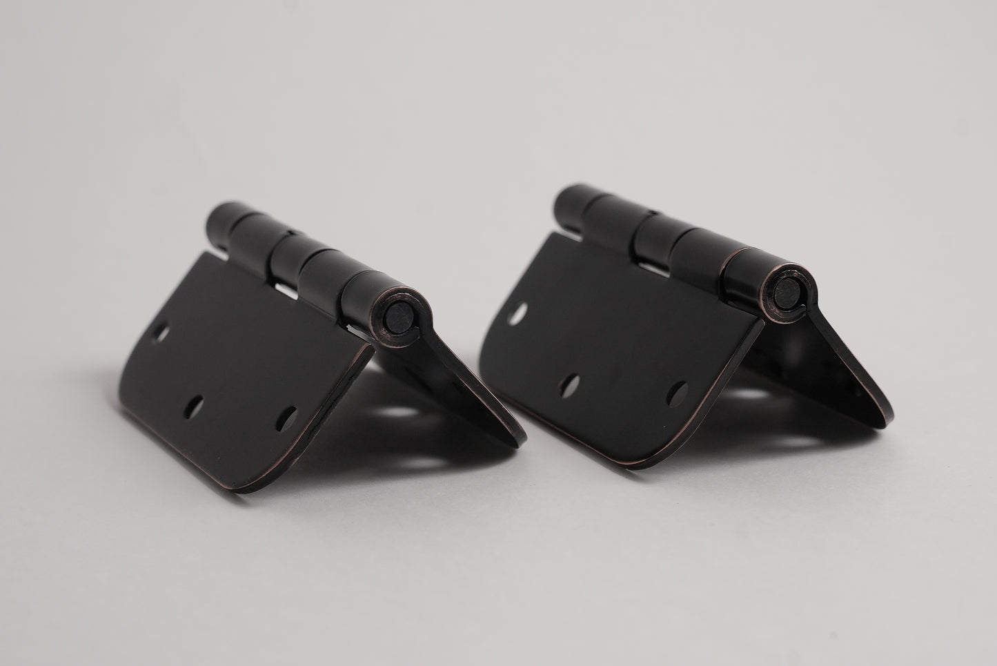 Aksis Hinge – Built-In Door Stop Hinge (Set with Screws) Rubbed Bronze